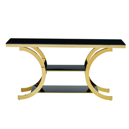 Front product view of the black glass console and paired gold crescent supports