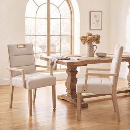 Natural finish beige upholstered dining armchair with a rubberwood frame