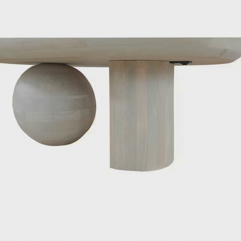 Close-up of the ball and slab supports beneath the oblong tabletop