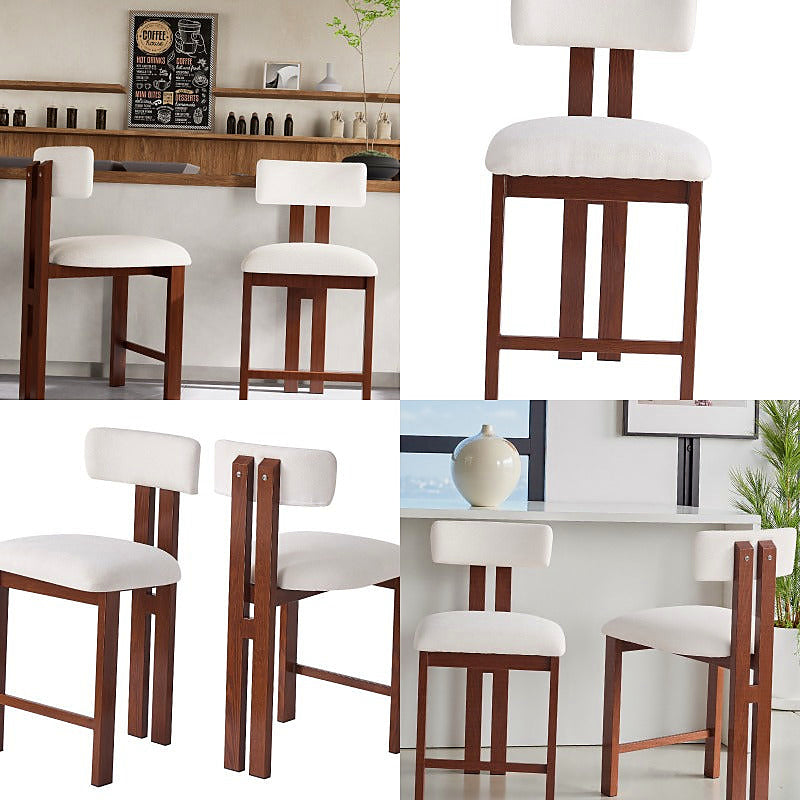 White upholstered counter stool with a brown frame and integrated footrest