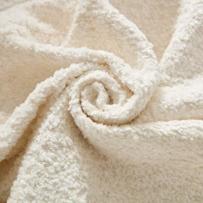 Ivory Curved Sofa with Four Pillows — alternate textured fabric close-up.