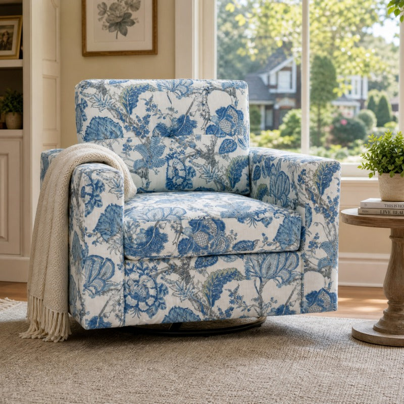 Blue Botanical Swivel Accent Chair — front view with throw blanket.