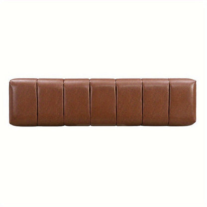 Top view of the brown bench's channel-stitched rectangular seat