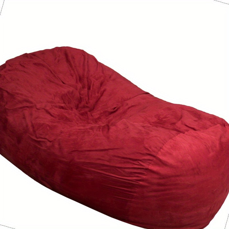 Angled close view of the red bean bag's curved lounge seat