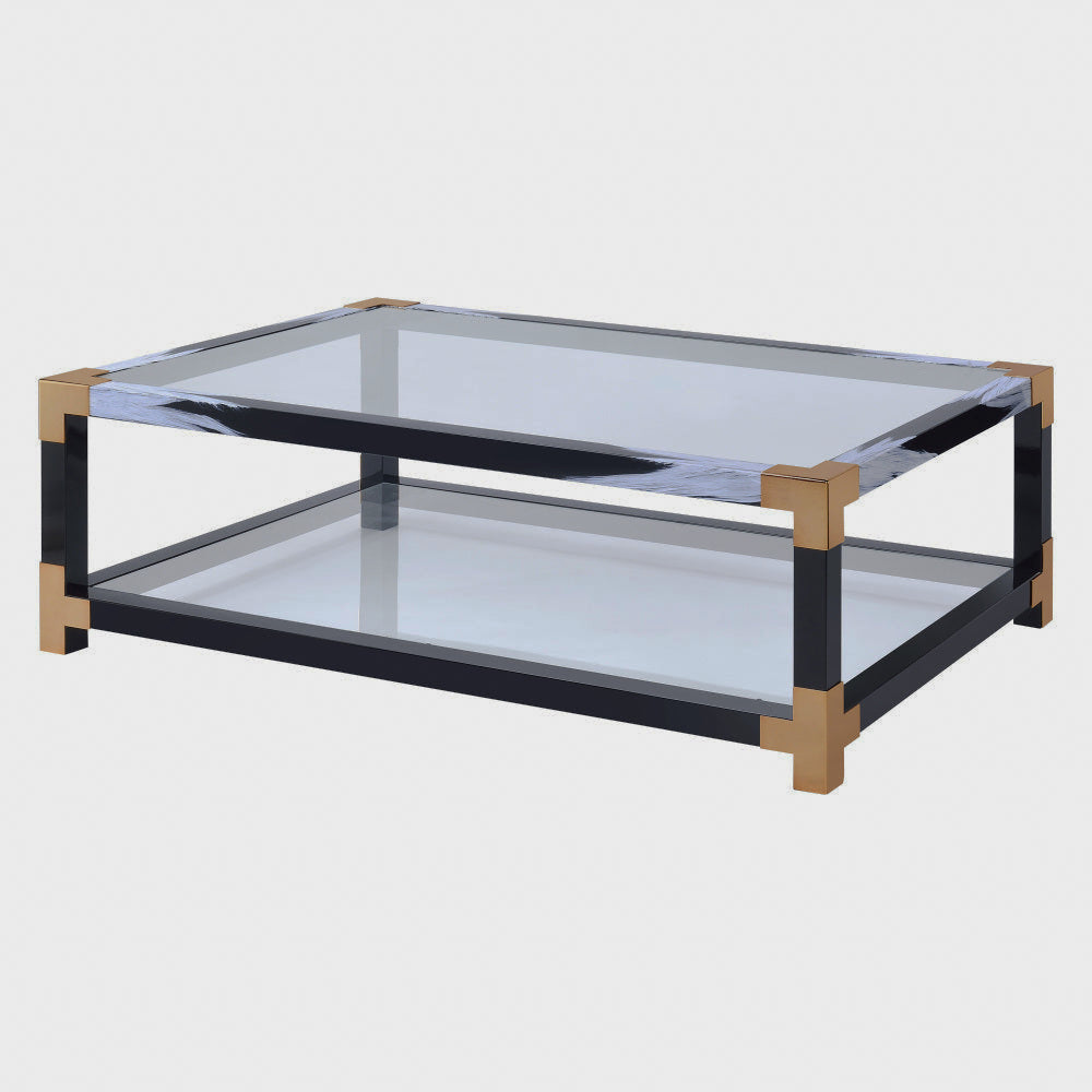 Two-tier rectangular glass coffee table with black legs and gold-tone corner details on white