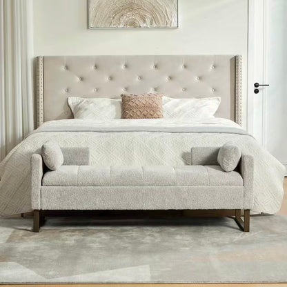 Front view of the light gray bench with stitched seat panels, upright arms, and dark rectangular leg frames