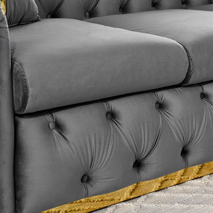 Velvet Chesterfield Sofa with Gold-Tone Trim — seat cushion and tufted front detail.