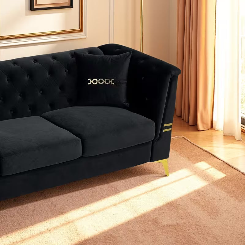 Black Velvet Two-Sofa Set — tufted back, pillow and gold-tone leg detail.