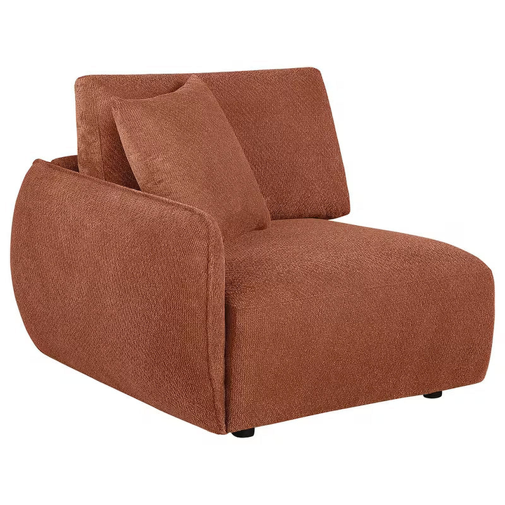 Coral Logan end seating module with a rounded arm and matching accent pillow.