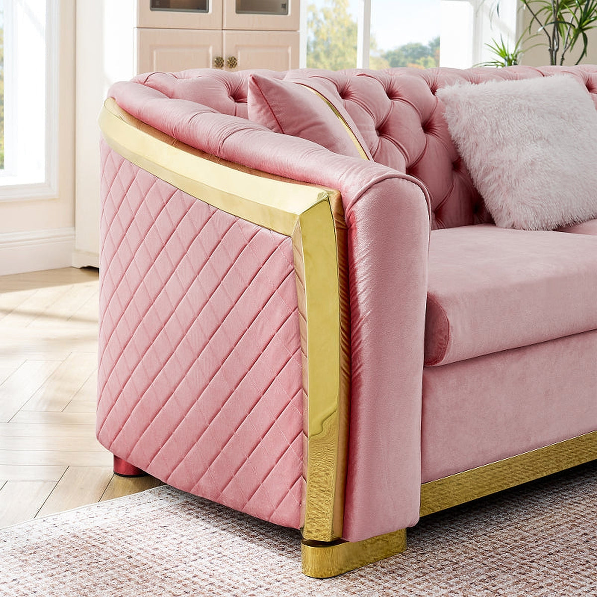 Pink velvet Chesterfield sectional - arm and quilted panel detail