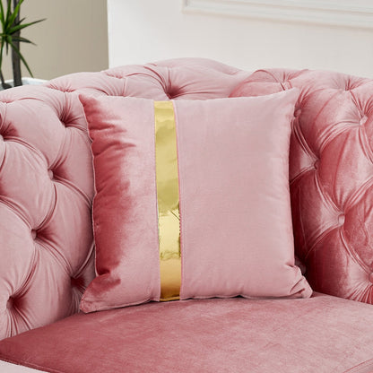 Pink velvet Chesterfield sectional - striped accent pillow