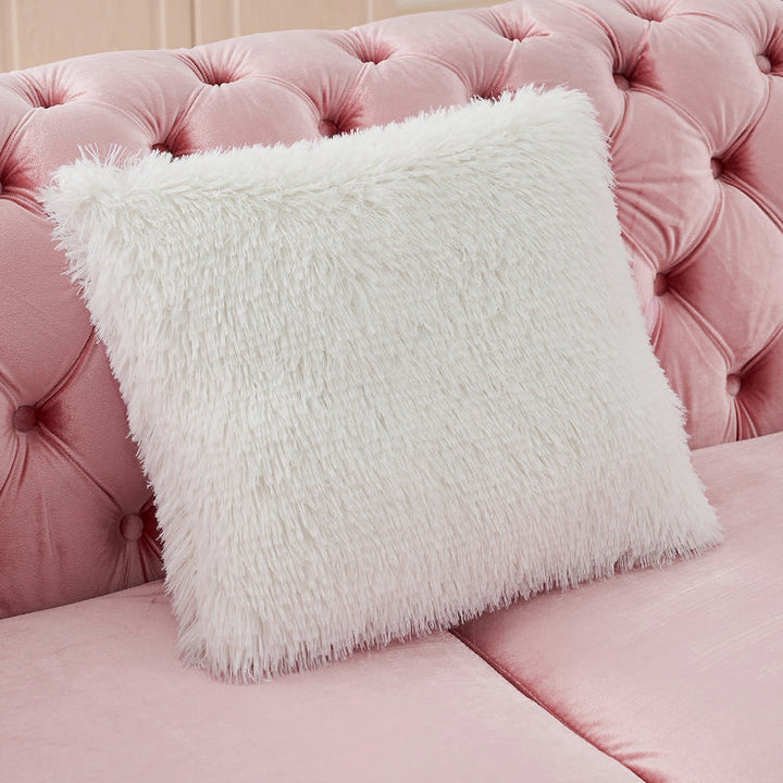 Pink velvet Chesterfield sectional - textured accent pillow